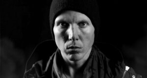 Manafest sets a microphone on fire to promote his latest song